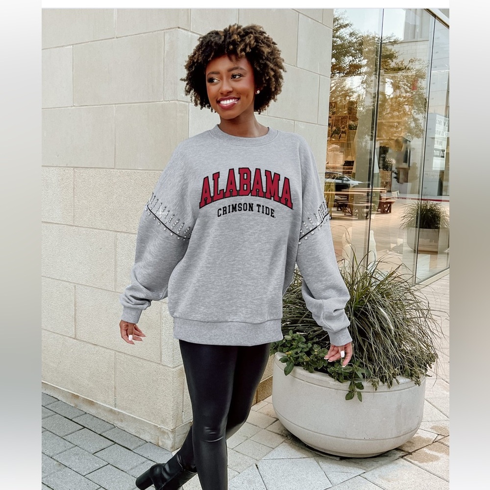 Alabama top. So stylish and stunning blank, blank on arms, one of a kind..